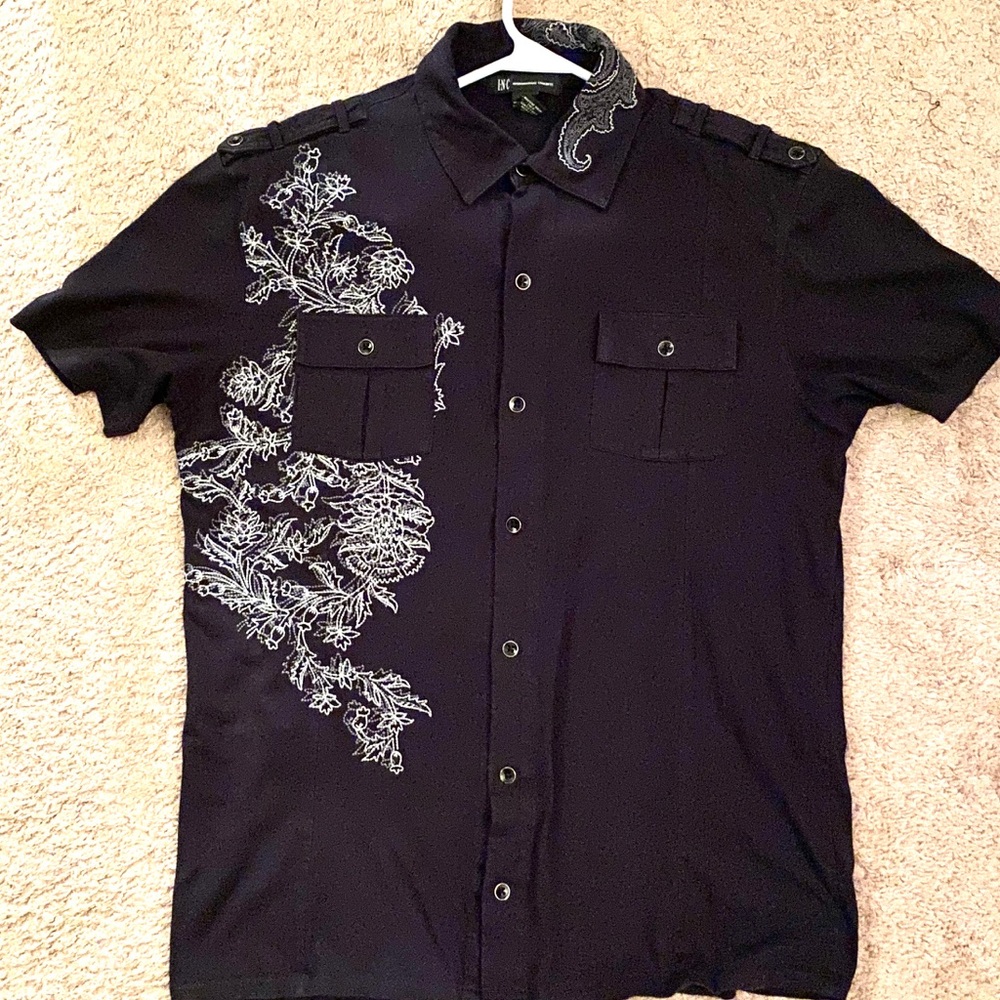 Men’s button I with embroidered design.